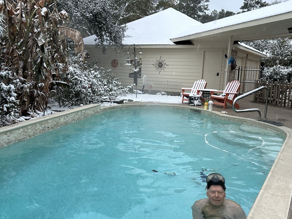 Some shots from our yard. Yes, my hubby still went swimming (it is heated) and I measured 2 inches at 7:40 am. Stay warm